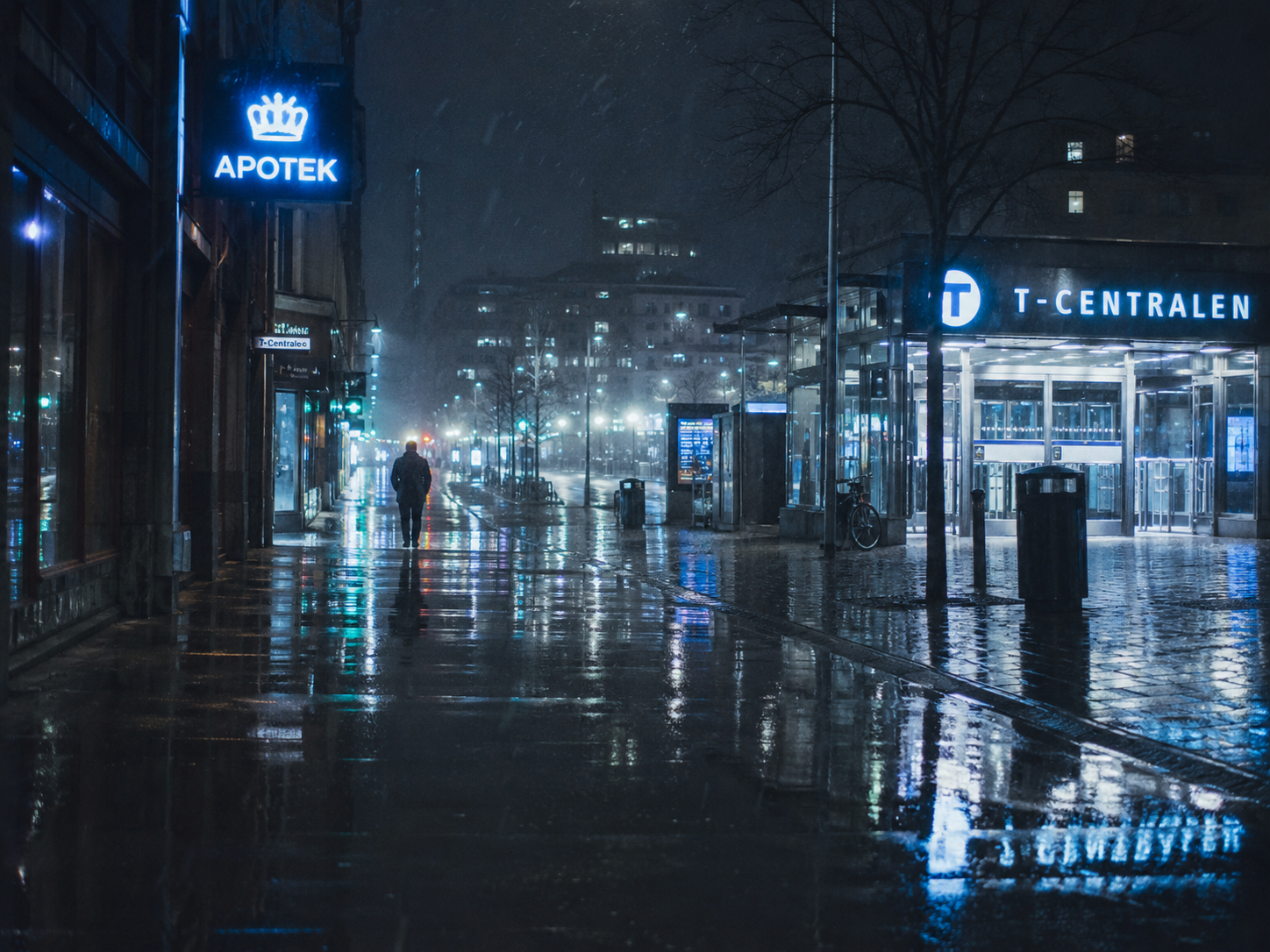 Rain-soaked night street near T-Centralen in Stockholm with blue Apotek pharmacy sign, wet pavement reflections and a lone figure walking through the city.